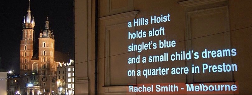 Poetry on walls, Krakow: a Hills Hoist, holds aloft, singlet's blue, and a small child's dreams, on a quarter acre in Preston - Rachel Smith - Melbourne