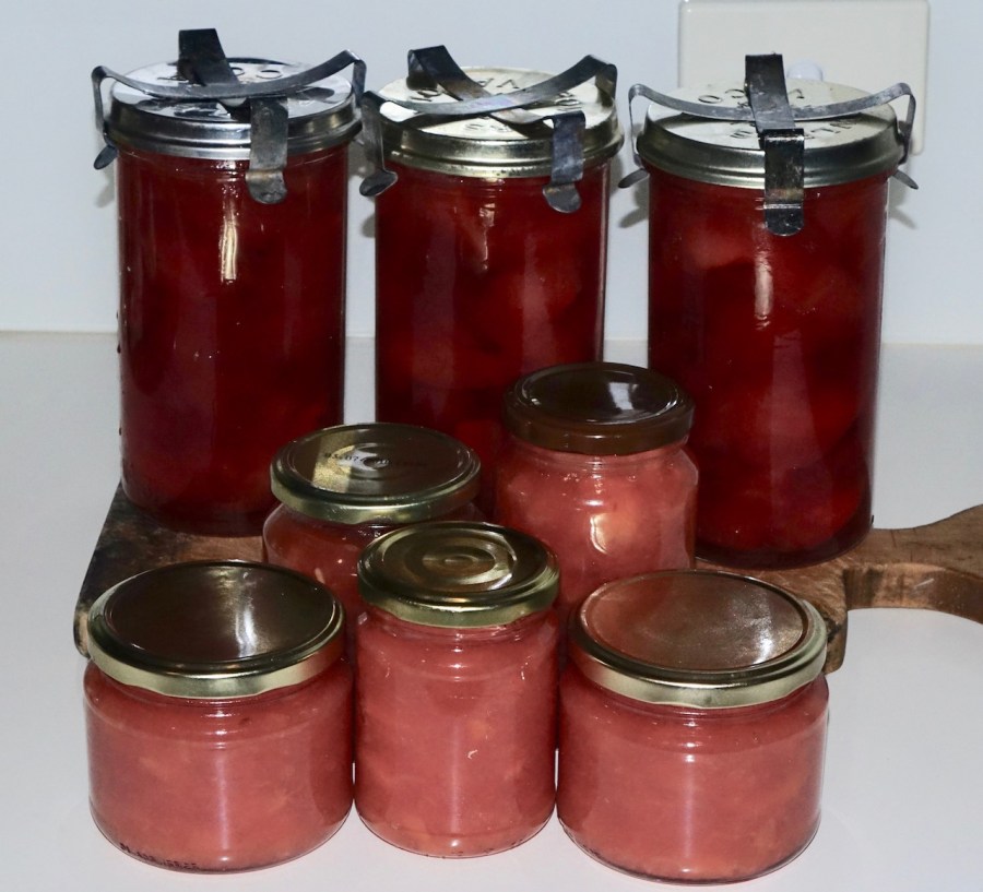 Three large jars of preserved quinces and five small jars of quince jam. Home made
